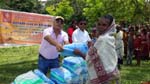 Rtn Dr. Navneet distributing mosquito nets