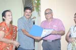 Charter member Rtn. Golap Sharma welcoming the new member Rtn. Jiten Adhayapak to the Club