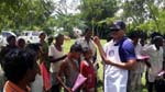Club Secretary Rtn. Purnajyoti Phukan distributing handbills explaining the dos & donts against mosquito killing