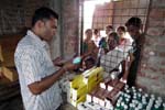 Distributing free medicines on dental treatment camp